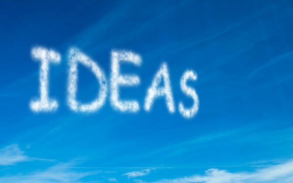 Fototapeta Ideas written in white in sky