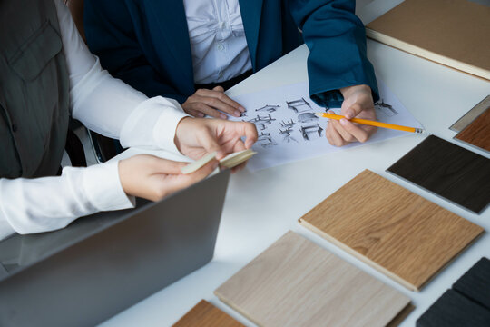 Interior Designer Consulting with Client on Material Selection