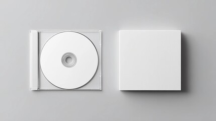 Blank cd in jewel case next to white box on grey background - mockup for branding