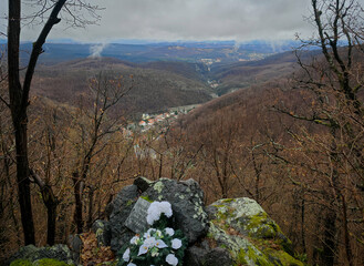 Memorial site with flowers at the St. Stephen Lookout above Lillafüred, offering a panoramic view...