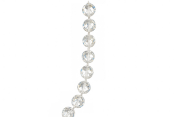 Elegant string of clear crystal beads hanging against a transparent background, perfect for jewelry or decorative projects