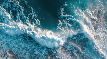 Fototapeta premium Aerial Shot of Ocean Surf and Foam in Motion Over Shallow Tropical Waters