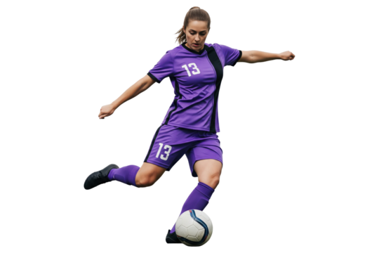 Female soccer player in purple uniform kicking ball isolated on transparent background
