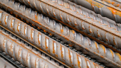 Steel reinforcement for concrete reinforcement. Pile of steel rebars stacked on a construction site