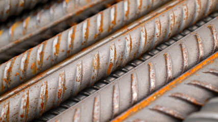 Steel reinforcement for concrete reinforcement. Pile of steel rebars stacked on a construction site