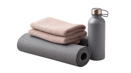 Yoga mat with folded towels and water bottle isolated on transparent background