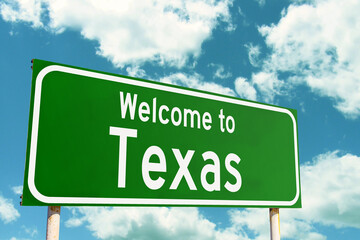 Welcome To Texas Green Road Sign at the entrance to the state.