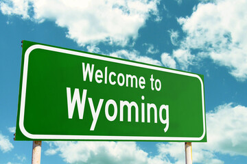 Welcome To Wyoming Green Road Sign at the entrance to the state.