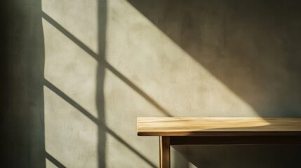 Wooden Table Against Sunlit Wall