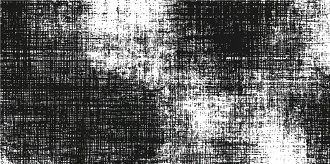 A black and white photo showcasing a textured surface.Textured gray fabric background