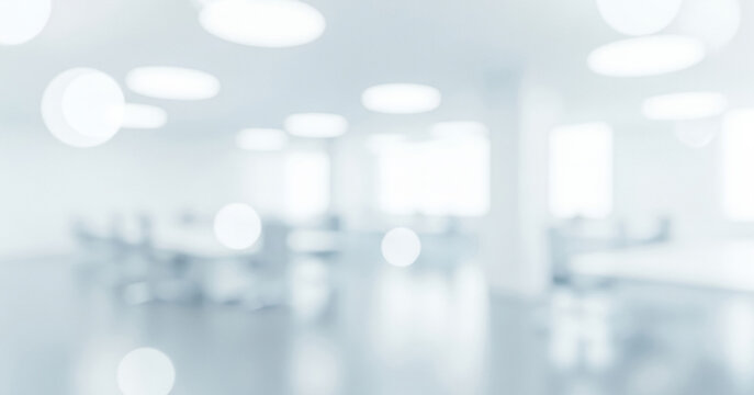 Blurred interior of a bright white office space with tables and chairs., often used in startup presentations, clean slide decks, or product concept mockups - Powered by Adobe
