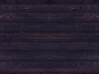 Dark color wood wall for seamless black wood texture background.