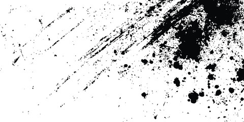 Abstract ink splatter background with black and white textures. A dynamic and chaotic effect, movement with different sizes of spots, splashes, drips, drops and smudges. Isolated on white background. 