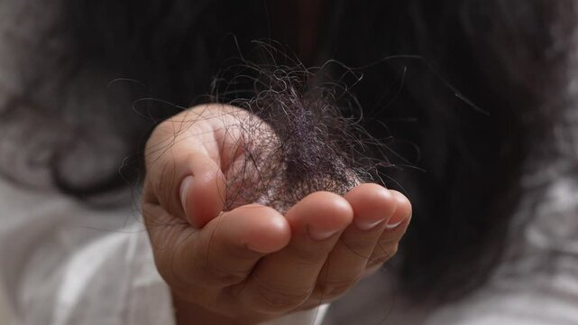 A woman with damaged hair loss