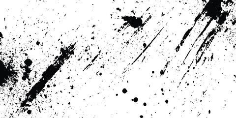 Abstract ink splatter background with black and white textures. A dynamic and chaotic effect, movement with different sizes of spots, splashes, drips, drops and smudges. Isolated on white background. 
