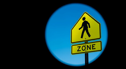 Yellow Cautionary Sign for Pedestrians within a Safety Zone with Deep Blue Sky