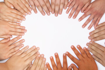 children of different nationalities put their hands together on a white background in the shape of a heart