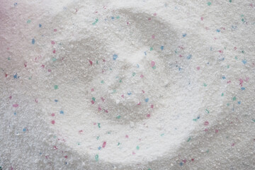 closeup of detergent powder in a container 