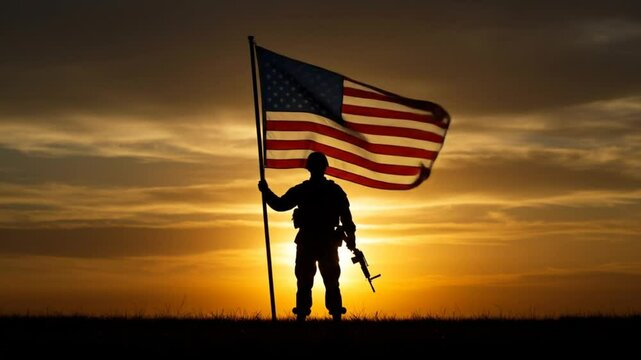 Silhouette of soldier holding american flag during dramatic sunset sky scene symbolizing