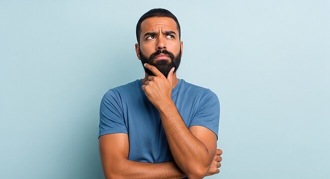 Pensive Bearded Man Thinking and Looking Upward
