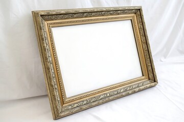 Gold framed picture with a white background