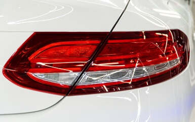 LED turn signal in the rear brake light of the car. Modern car lantern, close-up. Detail on the...