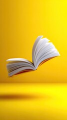 Open Hardcover Book Floating in Mid Air Against Yellow Background