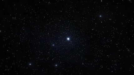 Fototapeta premium A starry night sky with a bright central star and several smaller stars.