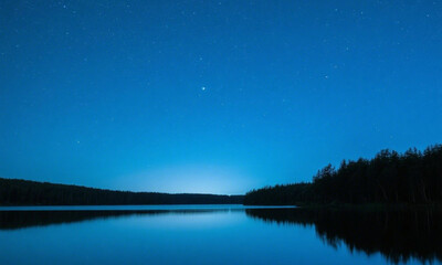 A starry night sky over a still lake, with deep blues, reflections of stars, and calm visual harmony &mdash; peaceful and poetic