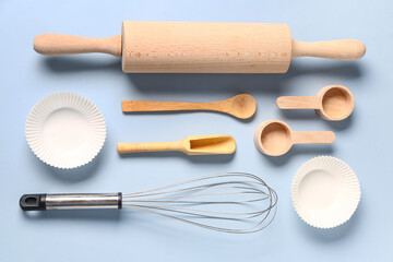 Baking utensils on blue background