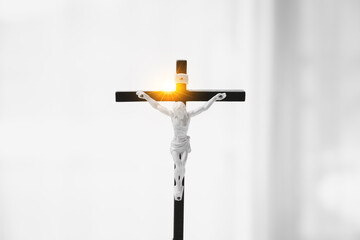 Religious person gazes at holy crucifix, seeing the hand of Jesus Christ, the crown of thorns, and...