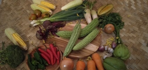 Vibrant Assortment of Garden Fresh Organic Vegetables and Fruits Displayed for Healthy Eating and...