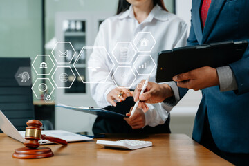 Modern legal tech consultation concept with smartphone interface, gavel and scales icons overlay, highlighting digital law, finance