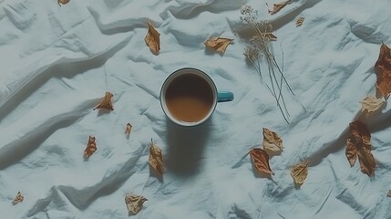 Cozy Autumn Morning: Coffee, Leaves, and Dried Flowers on White Linen