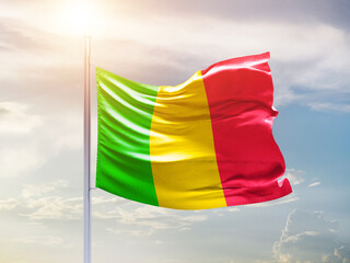 Mali national flag waving in an amazing sunlight. National flag waving on mast.