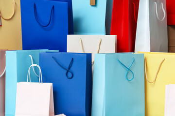 Texture of shopping bags as background, closeup