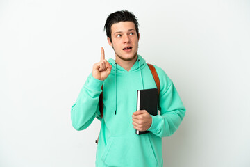 Young student man isolated on white background thinking an idea pointing the finger up