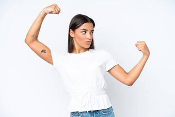 Young caucasian woman isolated on white background doing strong gesture