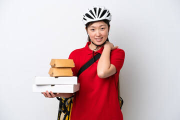 Young Chinese delivery woman taking takeaway food isolated on white background laughing
