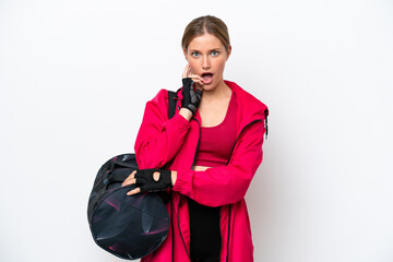 Young caucasian sport woman isolated on white background surprised and shocked while looking right