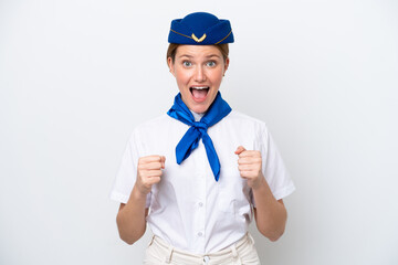 Airplane stewardess woman isolated on white background celebrating a victory in winner position