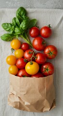 Fresh tomatoes and basil in paper bag
