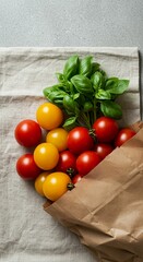 Fresh tomatoes and basil on tablecloth