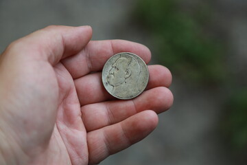 Old Polish silver coin in hand