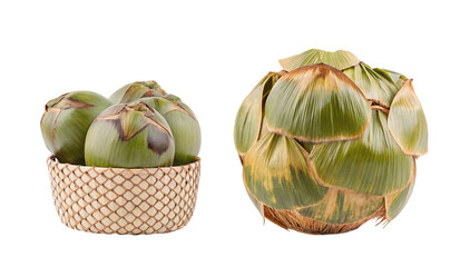 Naklejka premium Close up of green coconuts in a woven basket and a single coconut on a black background studio shot