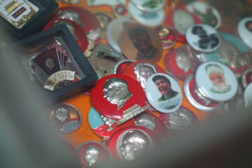 Mao Zedong badges can still be seen in antique shops in China, and young people buy them with teasing