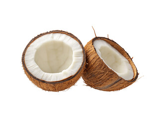 Two halves of a coconut with white flesh and brown shell isolated on a black background in a studio shot