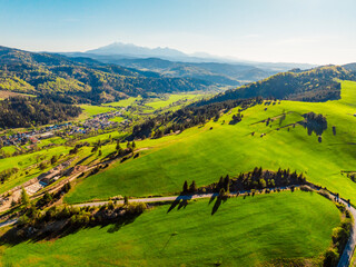 Mountain scenery with pastures and High Tatras mountains in the background. Pieniny mountains in Slovakia. View from Lesnicke sedlo