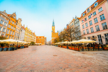 Fototapeta premium Gdansk with Motlawa river in Poland. Old town colourful house with saint Marys church i main square.
