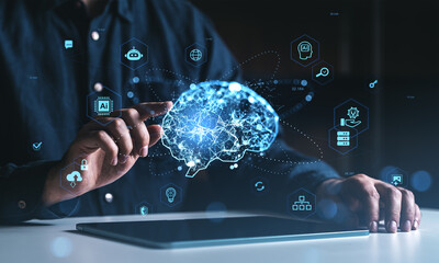 Human hand interacting with digital brain interface surrounded by technology icons representing...